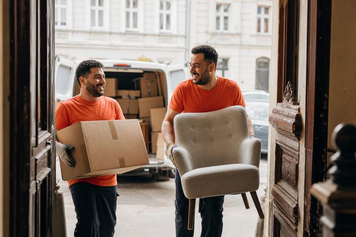Movers carrying boxes